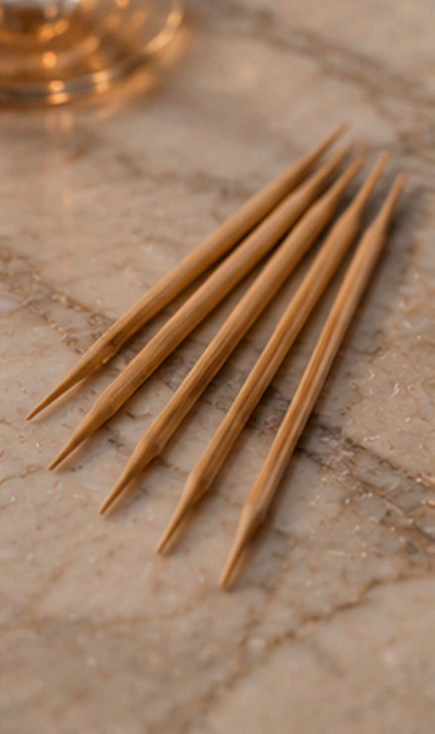 Set of birchwood Cinder Picks on a marble surface
