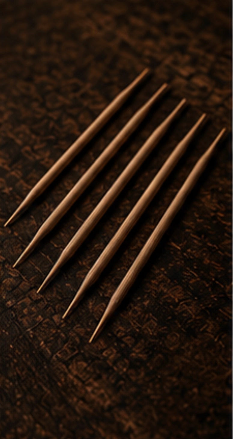 Set of Cinder Picks on a textured brown background