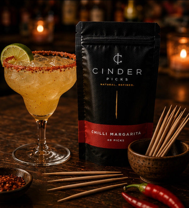 Cider Picks Chilli Margarita packaging with a cocktail and ingredients on a bar setting
