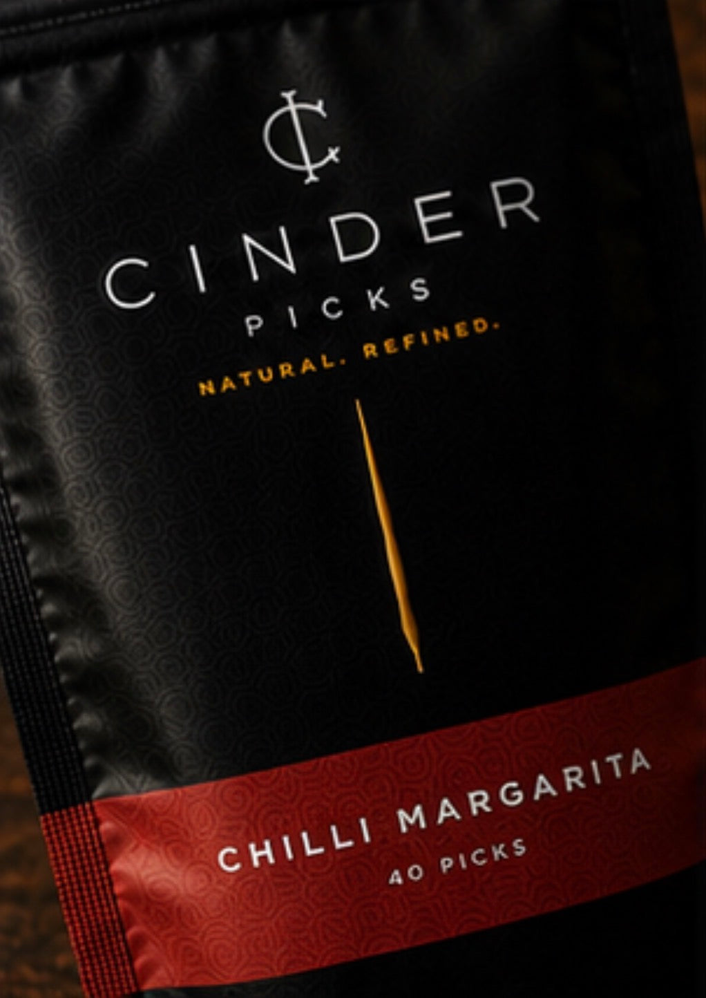 Cinder Picks Chilli Margarita packaging on a dark background